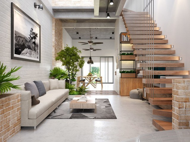 Hãy cùng chiêm ngưỡng chiếc cầu thang đẹp tạo nên điểm nhấn độc đáo trong căn phòng khách của ngôi nhà này. Sự kết hợp hoàn hảo giữa màu sắc, kiến trúc và bố trí nội thất sẽ mang lại cho bạn cảm giác thoải mái và sang trọng.
